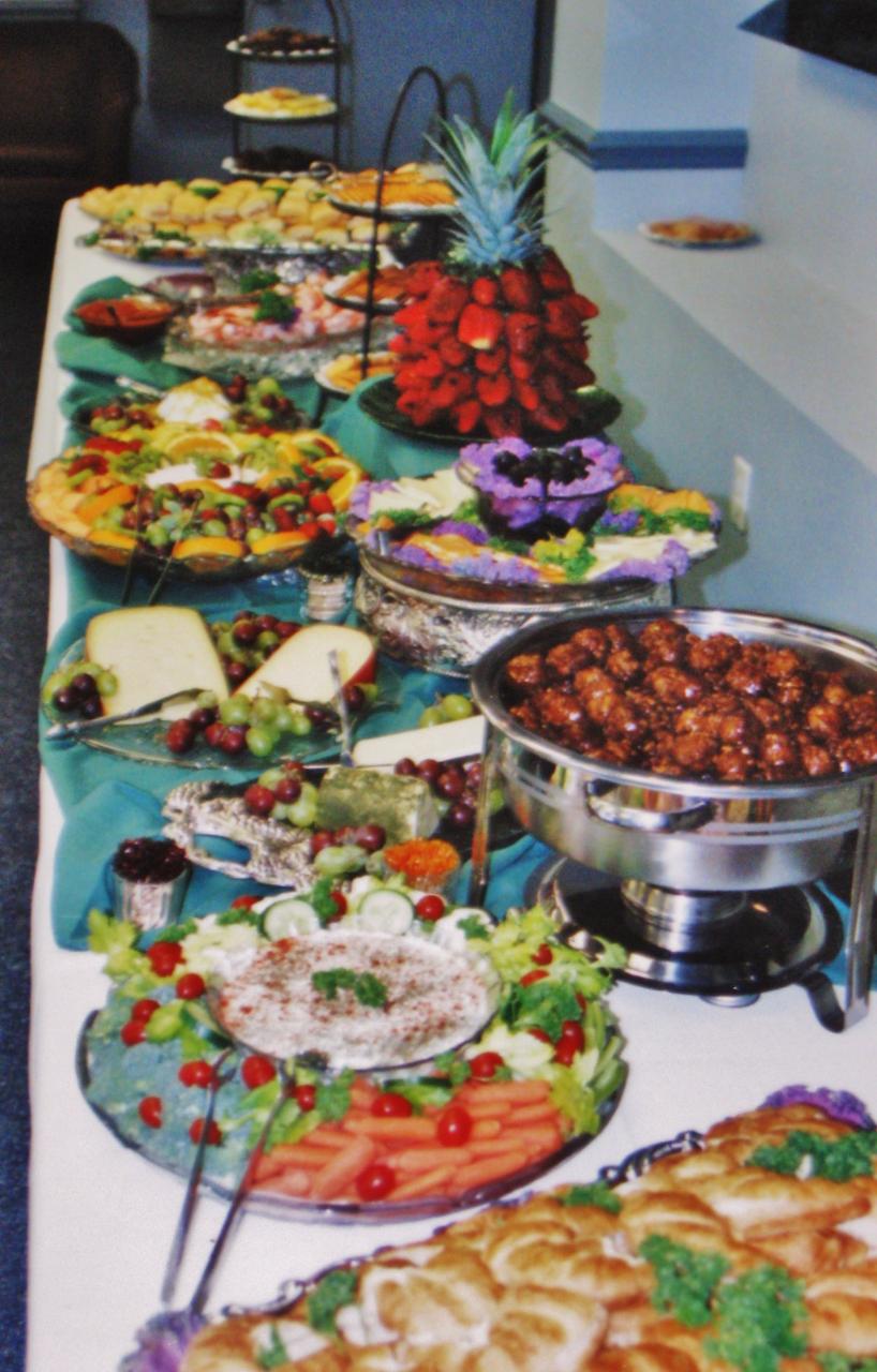 Buffet for a Drs. Office open house with smokey bbq meatballs, assorted cheeses w/crackers